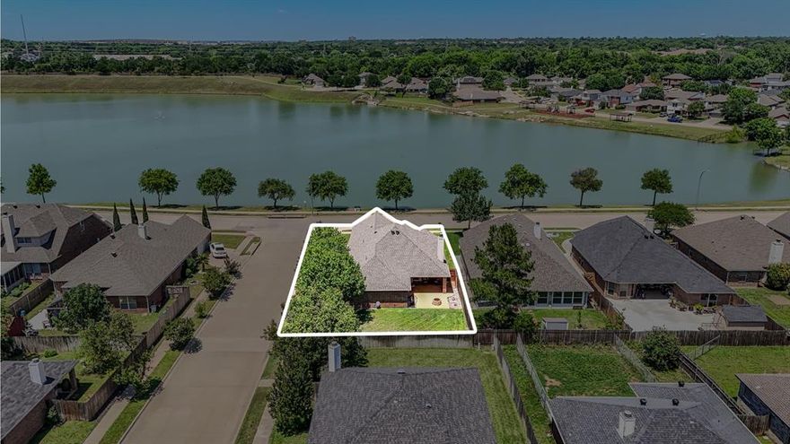 Nestled on a premium corner lot directly across from the neighborhood pond, fountain, walking trails, and park area, this beautifully maintained home offers the perfect blend of comfort, convenience, and lifestyle living.

From the moment you arrive, you’ll appreciate the charming curb appeal, mature trees, and inviting setting. Inside, the thoughtfully designed floorplan features spacious living areas, abundant natural light, and a warm, welcoming atmosphere throughout.  The kitchen opens seamlessly to the living and dining spaces, creating an ideal layout for both everyday living and entertaining. Generously sized bedrooms provide comfort and privacy, while the vaulted ceilings add architectural character and an airy feel. Step outside to enjoy the oversized covered patio and expansive backyard — perfect for morning coffee, evening gatherings, grilling with friends, or simply relaxing outdoors. The corner lot location provides additional space and enhanced privacy.

One of the home’s most unique features is its incredible location directly across from the scenic community pond with fountain, walking paths, benches, playground, and picnic areas — offering a peaceful setting and an active outdoor lifestyle just steps from your front door.
Conveniently located near shopping, dining, major highways, and highly rated schools, this home combines neighborhood charm with everyday accessibility.

This home offers something difficult to find — a peaceful, lifestyle-focused setting paired with everyday convenience. Whether enjoying sunset walks around the pond, fishing (catch and release), relaxing on the covered patio, or entertaining in the spacious backyard, this property truly feels like home.