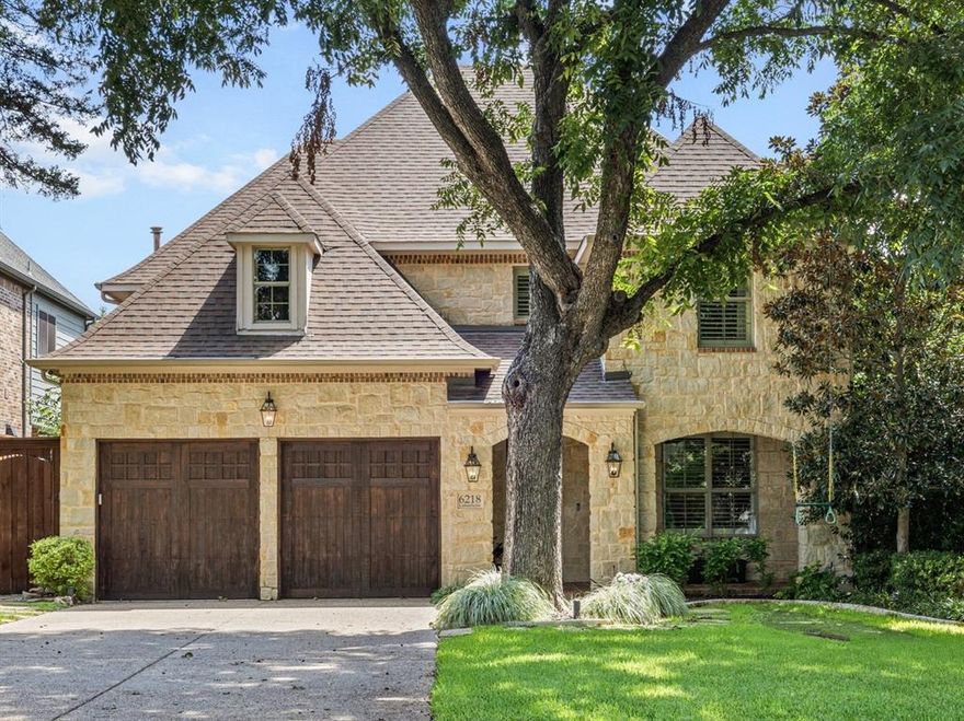 This beautifully appointed Lakewood Heights home offers a seamless blend of comfort, style, and functionality. Designed with entertaining in mind, the spacious living room is anchored by a cozy fireplace and complemented by an adjacent wet bar with wine fridge, while the formal dining room provides the perfect setting for hosting dinners. Upstairs, a large family room adds even more flexibility for gatherings or relaxed evenings, and a downstairs study creates an ideal work-from-home retreat. At the heart of the home, the eat-in kitchen is both elegant and practical, featuring stainless steel appliances, granite countertops, a central island, and a walk-in pantry, with a sunlit breakfast area just steps away. The primary suite is a true sanctuary, complete with its own fireplace, generous walk-in closet, and spa-inspired ensuite bath with dual sinks, soaking tub, and separate shower. Equally impressive outdoors, the fully turfed backyard is designed for effortless enjoyment, highlighted by a spacious covered patio with fireplace and retractable screens, a wooden privacy fence, and a sprinkler system for easy maintenance. Zoned to Geneva Heights Elementary, this home is just minutes from East Dallas favorites including White Rock Lake, Tietze Park, and the shops and dining of Lakewood Village—bringing the best of the neighborhood right to your doorstep.