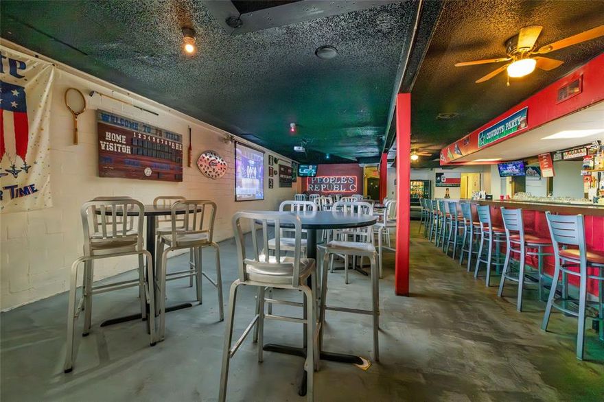 Incredible business opportunity near TCU—own a versatile commercial building with two separate operating businesses included in the sale. One side features an established bar equipped with multiple TVs, a projector screen, two pool tables, and full bar equipment, all conveyed. The other side includes a welcoming lobby, three private office rooms, and a fully operational gym located in the rear. Situated just off McCart Avenue, the property offers excellent visibility, a separate rear entrance with private parking, and easy access to all that Fort Worth has to offer. Both business entities will be conveyed with the sale, making this a rare turnkey investment in a high-demand area