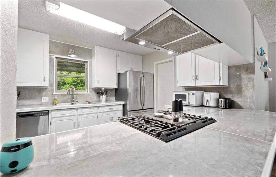 Spacious 3BR, 2B home is the one you have been waiting for! There are two living areas and a large dining area giving you plenty of room to host your family and friends! The kitchen has been updated in recent years and is open to the living area. The kitchen is equipped with stainless steel appliances including a gas range and the SS refrigerator will convey. The washer-dryer can convey with acceptable offer as well. There is also breakfast bar seating and newer flooring throughout the home. The primary bedroom has an en-suite bath with tiled shower and is split from the secondary bedrooms.  There is an updated hall bath located between the two spacious secondary bedrooms. Covered front and back porches, fenced backyard, storage building and a two-car attached carport make this a rare find at this price! Electric recently updated to 250-amp service! This property is NOT in a flood zone! Move-in ready! Call to schedule your showing today! This is a short sale.  Any offer will be contingent on USDA approval.