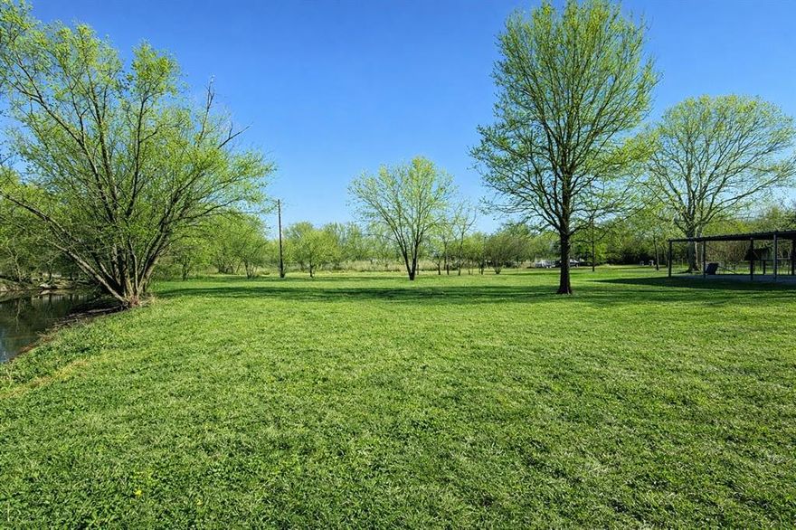 Your Country Resort awaits!  This property is truly a diamond in the rough! Home has been completely remodeled, this 3 Bed, 2 Bath Mobile Home has so many great features! Brand New Paint on Exterior, New Skirting surrounds the home, foundation has been perfectly situated with permanent foundation.  6 Car Carport!  The back porch is huge, plenty of space all your projects or parties!  New Storage building with plenty of space to add all your extras!  The stock pond is great!  The pond has bass and perch, plenty of water to fish or swim!  Front yard has expensive pipe fencing for animals and added privacy.  Walk path that wraps from the side gate to the front door! Large mature trees everywhere!  Inside, enjoy all new Luxury Vinyl Plank Flooring in the Living spaces and new carpet in bedrooms!  Kitchen is open to living with nice black appliances, all new dishwasher, and new paint everywhere!  All new fixtures, and interior paint that is ready for your move!  Primary offers a large room with an extra office or flex space.  Primary bath is large with a nice garden tub, new fixtures, and separate shower!  Rooms are large and plenty of closet space as well!  This one won't last at this price!