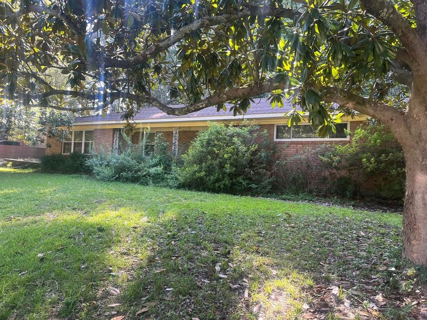 Calling all investors! Great investment opportunity! 3 bedrooms, 2 full bathrooms, 2 dens, wood burning fireplace, eat-in dining, detached 2 car garage.  Home sold as-is.