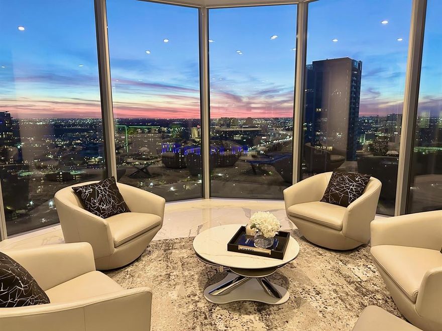 Perched on the 22nd floor of the iconic Azure Condominiums, this modern 3-bedroom residence delivers a rare combination of scale, design, and western sunset views—offering a true turnkey alternative in one of Uptown’s most sought-after luxury towers.

Spanning approximately 2,382 square feet, the home has a clean, modern aesthetic and meticulous attention to detail. Floor-to-ceiling glass frames expansive horizon views, filling the living and dining spaces with natural light and creating a dramatic backdrop for both everyday living and entertaining.

The open-concept kitchen has been thoughtfully redesigned with premium finishes, custom cabinetry, and high-end appliances, seamlessly connecting to the main living area. Each of the three bedrooms features a private en-suite bath, providing comfort and privacy for both owners and guests, while the primary suite offers a refined retreat with oversized bath and generous closet space.

What truly distinguishes this residence is its effortless livability—every detail has already been completed, allowing the next owner to move in immediately. In a building where many comparable units require updating, this is a rare opportunity to acquire a fully finished product at scale.

Additional highlights include three private garage spaces—an uncommon and highly valued feature—along with full-service amenities including 24-hour concierge, resort-style pool, fitness center, and resident lounge.

Ideally located in the heart of Uptown, just moments from the Katy Trail, premier dining, and Dallas’ vibrant urban core, this residence offers the best of lock-and-leave luxury living.

A compelling offering for buyers seeking elevated design, premier views, and immediate enjoyment in one of Dallas’ most prestigious high-rise communities.