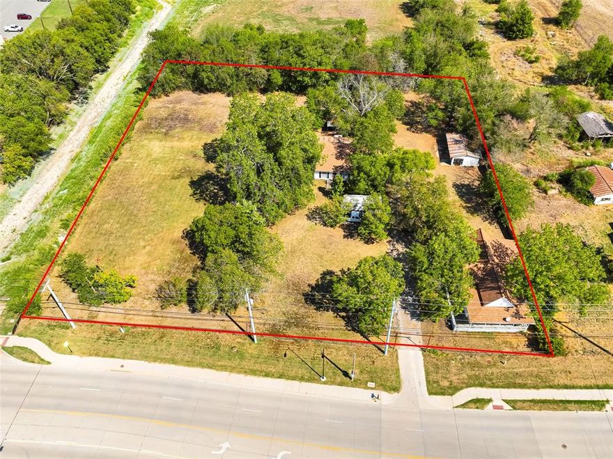 PRIME LOCATION for a business or investment property situated on almost 2 acres in Melissa.  Situated in the Melissa commercial overlay district and less than .25 miles from Melissa's proposed Melissa Village that will include Retail, movie theatre, restaurants and much much more.  Melissa road will be a major thoroughfare.  Perfect location for offices, doctors office or shops. The road to the left of the property is scheduled to be expanded by City of Melissa at a future date.  Home on property is cute and would make a great office.    It was built between 1920 and 1940 but there is no active record.  Property is priced as land value only.     All information to be verified by buyer and or BA with the City of Melissa. Property is zoned residential. Buyer responsible for changing zoning for their specific use.  Please do not go on property without an appointment.
