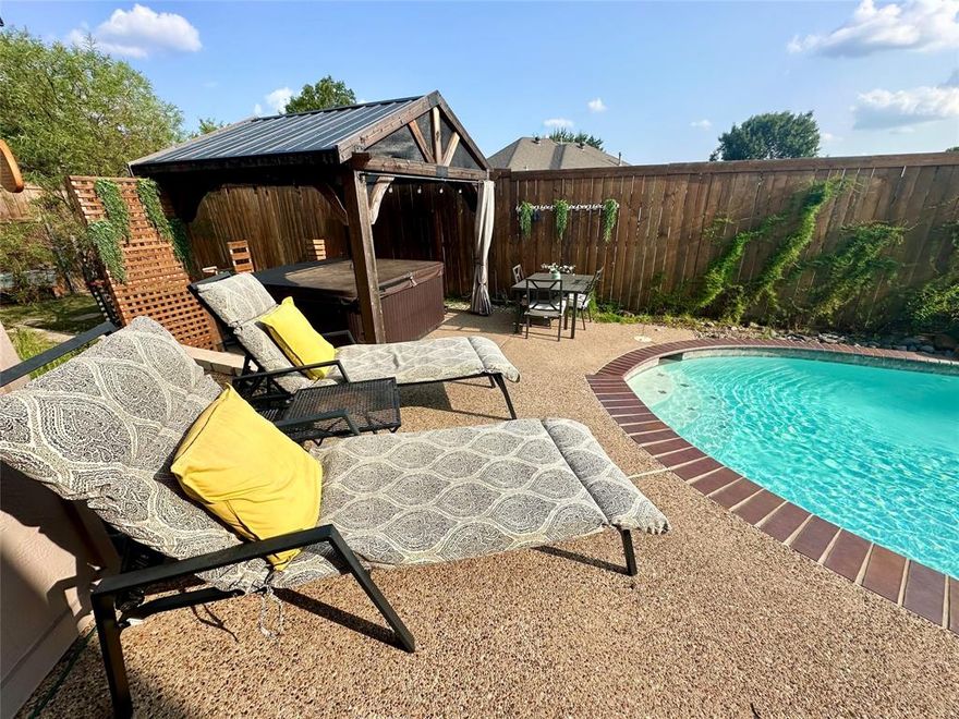 Welcome to this beautiful and spacious gorgeous home offering the perfect blend of comfort, style, and functionality. Featuring 4 bedrooms, 2.5 bathrooms, and over 2,000 square feet of living space, this property is designed for both relaxation and entertaining. Step inside to discover soaring 12-foot ceilings, wood-look tile and hardwood floors, and a stunning stone fireplace that creates a warm and inviting atmosphere.
The chef’s kitchen is a true centerpiece, complete with granite countertops, stainless steel appliances, and ample cabinet space. Enjoy two dining areas ideal for gatherings and a large primary suite featuring an impressive en suite bathroom with a luxurious clawfoot tub, dual vanities, and a separate shower.
Step outside to your private backyard oasis—featuring a sparkling pool that reaches up to 9 feet deep, a large standalone covered hot tub, and a convenient storage shed. The scenic setting is enhanced by peaceful views of horses and open acreage across the street, giving this home a tranquil country feel with all the modern upgrades you need.
Additional highlights include an oversized utility room and thoughtful touches throughout that elevate everyday living. This upgraded home is move-in ready and waiting for the perfect buyer to enjoy everything it has to offer!