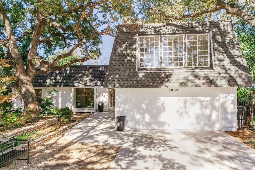 This very special home is nestled in ancient trees at the end of the cul-de-sac in the prestigious Las Colinas neighborhood of University Hills.  The curb appeal is astounding but the newly updated interior is a very special surprise.There are two cozy fireplaces, one upstairs and one that is a see-through from the Great Room to the Kitchen.  Just ready for the winter weather that is right around the corner, you can imagine the charm they will bring to your home.The upstairs has one very beautiful Bedroom and bath that looks like you are living in a treehouse with the garden view of all the windows.  The Kitchen is definitely a Chef's Kitchen with recent stainless appliances and custom built cabinets.  There is even extra insulation for energy efficiency.  The location of this home is amazing because the commute is very easy to both airports and also to downtown.  Over 250 restaurants are in Las Colinas within 10 minutes of this home.   You are just in time to watch your favorite football teams around the fireplaces and to host your family Thanksgiving feast.  Call today to see this amazing property.