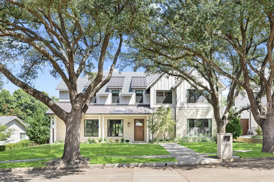 This breathtaking home blends timeless design with modern sophistication, ideally situated in one of Lakewood’s most coveted enclaves just steps from White Rock Lake. Nestled on a serene, tree-lined block, this custom residence by Montgomery Custom Homes sits on an oversized .29-acre lot that perfectly frames its best-in-class amenities. A picturesque drive-up welcomes you with an inviting front porch, gas lantern, and mature live oaks. Inside, white oak hardwoods, striking beam details, and refined transitional design create an atmosphere of understated elegance. Anchored by a beautiful center fireplace, the family room flows into the dining room and chef’s kitchen, with expansive windows and sliding doors that frame the outdoor retreat—perfect for entertaining. The dining room offers custom built-in cabinetry, while the kitchen features a top-of-the-line Thermador appliance package with dual dishwashers, a secondary prep kitchen, and a walk-in pantry. The inspiring primary suite is thoughtfully designed with a private vestibule, vaulted ceilings, spa-like bath with dual vanities, and a generous walk-in closet. Each secondary bedroom includes an en-suite bath and walk-in closet, ensuring comfort and privacy. At 5,276 square feet, this home has it all: a dedicated study overlooking the front yard, a spacious upstairs game room, a large mudroom, and two half baths. The tranquil backyard feels like a private sanctuary, surrounded by treetop views that create a seamless connection to nature. Designed for both relaxation and entertaining, it features an incredible outdoor living center with a full kitchen, built-in fire pit, and multiple areas for dining and lounging. Expansive green space completes the retreat and allows plenty of space for a pool. Enjoy peaceful mornings, lively gatherings, or quiet evenings under the stars—all to be enjoyed year-round. Homes rarely come available in this sought-after pocket—truly a special location for families & outdoor enthusiast.