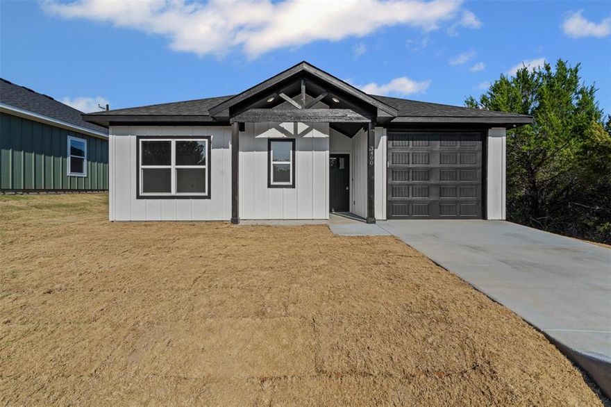 Awesome opportunity to own a BRAND NEW HOME at entry level pricing! Hard to find a new build at this price in Granbury! Built with modern features like a wide open floorplan, wood-look tile throughout, granite counters, custom stained cabinetry, kitchen island, stainless steel appliances, light and open, modern paint schemes, custom tiled bathrooms, large bedrooms, spacious master with custom en suite bath and walk-in closet, freshly landscaped yards, and tons of potential for customization. Built with energy star systems, double-paned windows, tons of insulation, electric WH, efficient HVAC, all means huge savings on utilities. Come see this one and the one next door before they're gone! Don't miss this opportunity to get a new and modern home at an awesome price!