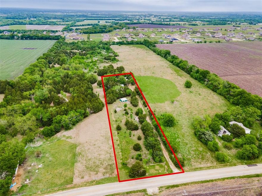 Discover the opportunity to own 1.9 acres of unrestricted land in the peaceful countryside of Farmersville, located within Collin County and served by Blue Ridge ISD. This property is ideal for those looking to build a custom home, place a new manufactured home, or invest in land with flexible residential use. The lot features existing utilities, including co-op electric, rural water access, and septic, offering a solid foundation for future development. Situated outside city limits, you’ll enjoy the freedom of no known restrictions and plenty of space to create your vision. The property currently includes a distressed home that is not safe for entry and will require removal, as well as a mobile home that can also be cleared, making this a true land-value opportunity. With streets already installed and easy access via county roads, this acreage provides both convenience and a quiet rural setting. Whether you're looking to build, invest, or bring in a new home, this property offers endless potential in a growing area.