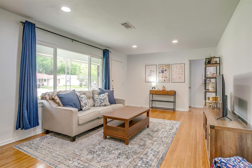 Beautifully updated while keeping its original character, this home offers a rare combination of style, functionality, and move-in-ready convenience in one of Fort Worth’s most charming neighborhoods. This updated Fort Worth home is full of thoughtful improvements throughout. With 3 comfortable bedrooms and 1 completely remodeled bathroom, the layout feels bright, open, and inviting thanks to the large living space and abundant natural light. Original character pairs nicely with the modern updates, including original hardwood floors and a separate full-size utility room finished with a sliding barn door. The kitchen has been refreshed with quartz countertops, stainless steel appliances, white tile backsplash, new flooring, and plenty of cabinet space, creating a clean and functional space for everyday living. The bathroom was fully redesigned with custom tile, updated fixtures, a modern vanity with a quartz countertop, and distinctive wallpaper details that add personality without sacrificing style. Recent improvements include updated electrical and plumbing, new windows, fresh paint, new lighting and fixtures, and additional upgrades throughout the home. Outside, the large grassy backyard offers plenty of space to relax or entertain. Located on a quiet tree-lined street within walking distance to Shady Oaks Country Club, this home combines neighborhood charm with convenient access to Fort Worth dining, shopping, and major roads.