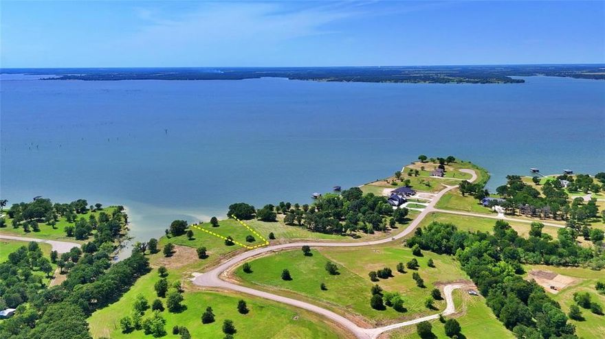 Experience elevated lake living on one of Texas’ largest and most desirable lakes. This rare 1-acre lakefront homesite on Richland Chambers Lake offers over 150 feet of shoreline and a prime elevated position capturing breathtaking sunset views.

Located in the private, gated community of Admiral Shores, this property features brand new paved roads, underground utilities, and ample space to build your dream lake home and private boat dock.

Enjoy peaceful lake living just a little over an hour from Dallas, with the flexibility to build when you're ready and a minimum of only 1,400 sq ft.

Whether you're planning a weekend retreat or full-time lake living, this is a rare opportunity to own premium waterfront property on Richland Chambers Lake.