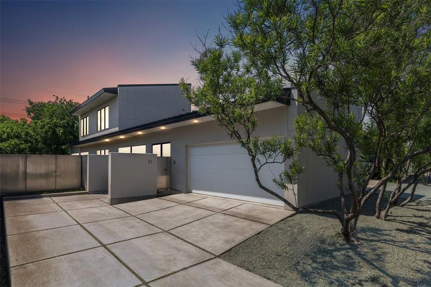 Architect Driven eco-efficient Modern Home in the Urban Reserve of Dallas. Steps away from the green belt and White Rock Creek Trial. Enter through a private entrance and be encompassed with a surreal feeling of peace. The main living space has soaring ceilings, concrete floors, LEED standard double pane walls of glass that open to a lush breathtaking view of the creek. The kitchen flows into the living space with new tile, granite counters, concrete floors, SS appliances,  and custom designed cabinet system. Owners retreat is down with En-suite bathroom, Large walk in shower, walk in closets, new lighting, and new sinks. Separate Office Space downstairs in addition to the 3 bedrooms. Other bedrooms are up with bamboo floors and spectacular treetop views. Attached 2 car garage. Perfect outdoor yard that is great for entertaining.