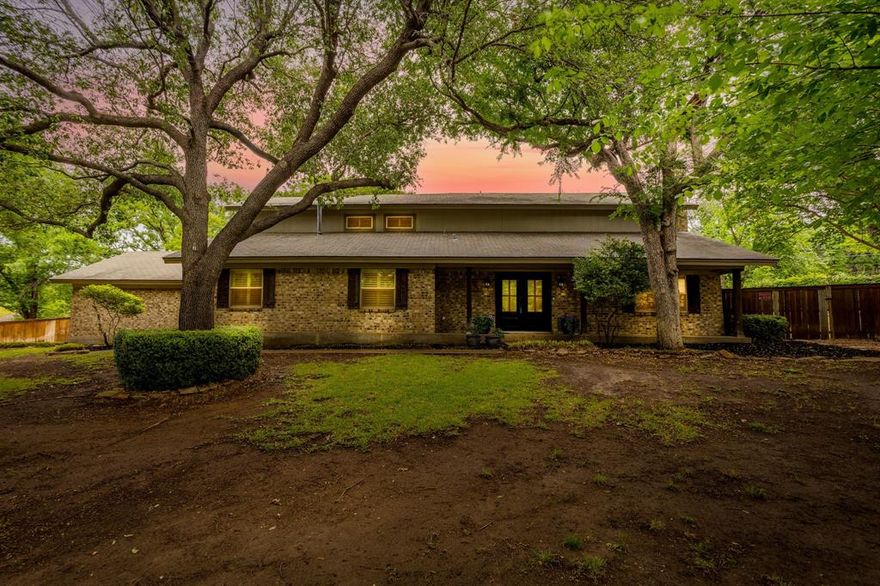 Enjoy lake living with exclusive access to Eagle Mountain Lake in this beautifully updated home, tucked away on a cul de sac with over half an acre. The HOA offers a private boat ramp and a playground along the canal, making this a great fit for anyone who loves being near the water.



From the inviting front porch and steel double door entry, you walk into a warm and comfortable living space with a wood burning fireplace. The formal dining room flows into a fully updated kitchen with high end appliances, including a stove with air fryer and convection features, and large new windows that overlook the backyard and bring in great natural light.



The downstairs layout offers three additional bedrooms and one and a half bathrooms, giving you plenty of space for family, guests, or a home office. Upstairs, the private primary suite feels like a retreat with a spa style bathroom that includes a soaking tub, glass surround shower, and separate his and her closets. There is also a large second living area upstairs with its own fireplace and sliding doors that lead out to a balcony, perfect for relaxing or entertaining.



This home has been thoughtfully maintained and updated throughout with no carpet anywhere, plantation shutters on all windows, new windows and sliding doors, and an upgraded electric panel. The fireplace has been cleaned annually for peace of mind.



The oversized two and a half car garage offers extra storage space, and the property also includes well water access for irrigation and outdoor use.



This is a rare opportunity to own a move in ready home with lake access and plenty of apace!
