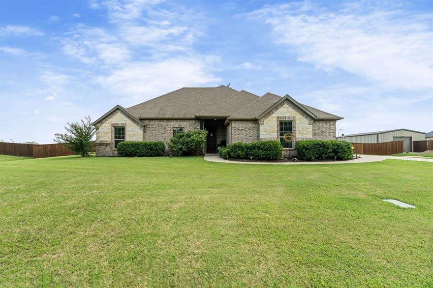 Welcome to this beautifully crafted 4-bedroom, 2-bath home by Castlerock Custom Homes, where high-quality construction meets peaceful living just outside city limits! Situated on a fully fenced 1.03-acre lot along a paved road, this home offers the perfect blend of space, privacy, and convenience.
You'll love the setting—a serene neighborhood of well-maintained custom homes, with easy access to the interstate for quick commutes while enjoying the tranquility of country living. Inside, the open-concept layout is both spacious and functional, featuring custom cabinetry, modern finishes, and thoughtful design throughout. The split-bedroom floorplan ensures privacy, with a luxurious primary suite that includes spa-like features and generous closet space. Outside, the expansive yard is fully fenced—perfect for kids, pets, and backyard BBQs. Whether you want to build a shop, put in a pool, or simply enjoy the wide-open space, the possibilities are endless. No city taxes and no HOA!
