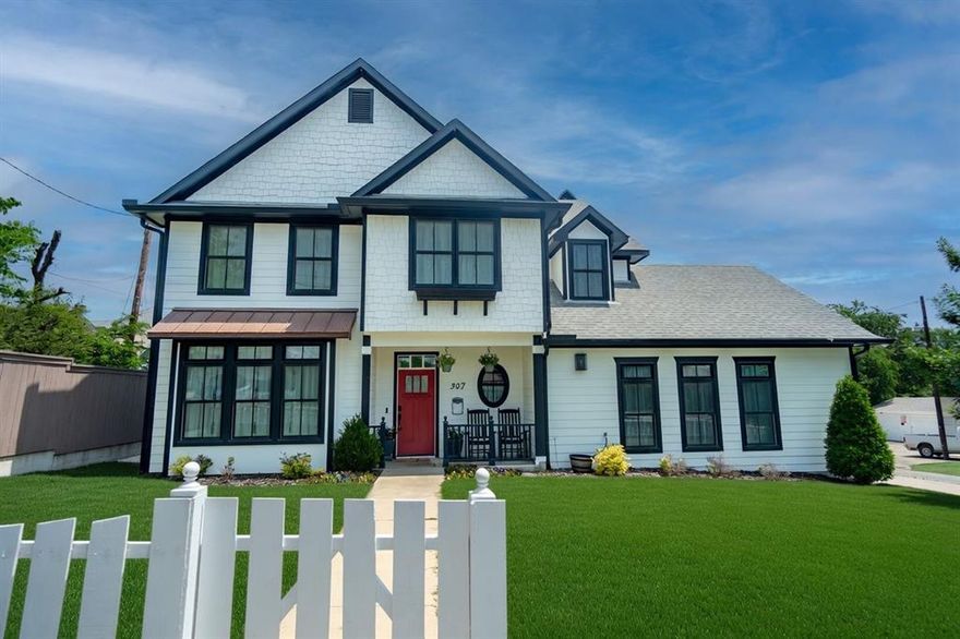 Steps from Historic Downtown McKinney Square – A Rare 2019 Custom Gem
This stunning 2019 custom-built home delivers the perfect blend of small-town charm and modern luxury. Built by the highly regarded British Builder, known for exceptional craftsmanship and timeless finishes, this residence offers quality you can feel the moment you arrive.
Imagine strolling to downtown shops, restaurants, and events, then returning to your own peaceful corner lot sanctuary, framed by a classic white picket fence. Inside, rich hardwood floors flow throughout, complemented by a beautiful farmhouse sink, premium cabinetry, and high-end countertops. Thoughtful details elevate every space: elegant higher-end chandeliers and lighting, luxurious hardware, and solid-core doors that add weight and sophistication.
The oversized garage features 9-foot tall doors to accommodate larger vehicles, plus abundant storage. A striking full-brick chimney anchors the fireplace, adding warmth and character. Upstairs, one bedroom is currently configured as a flexible home office—ideal for today’s lifestyle.
Outside, the beautifully landscaped backyard offers a relaxing pergola, and a fire pit amongst  flowering Magnolia trees, creating a private retreat. Efficiency meets comfort with a top-tier 25 SEER AC unit, delivering whisper-quiet performance and remarkably low utility bills.
Homes of this caliber—custom-built with this level of care and in this enviable walk-to-everything location—rarely become available. Don’t miss your chance to own a true standout in one of North Texas’ most desirable downtown communities.