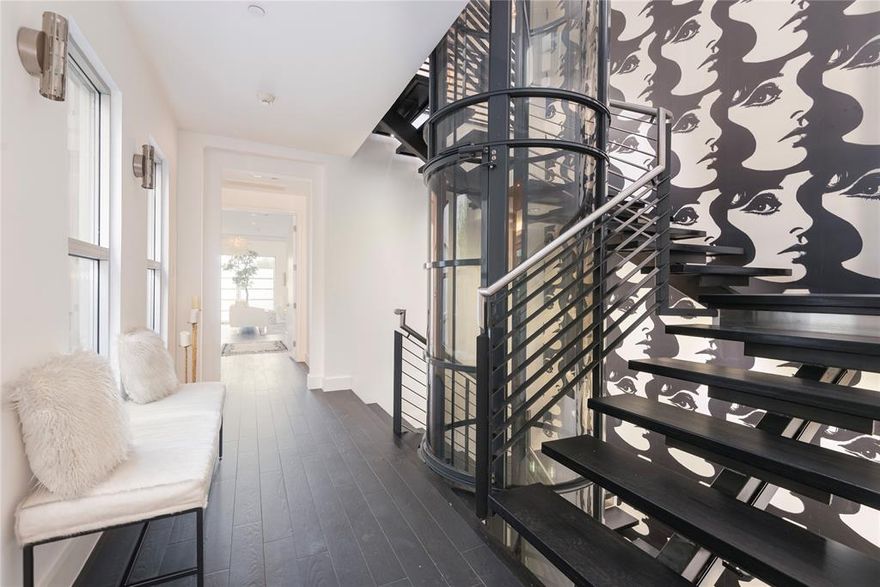 Experience refined city living at its most inspired at 3629 Brown Street a meticulously designed townhome that offers over 4,800 square feet of luxurious, art infused space. With **three expansive master-sized bedrooms and four bathrooms, this exceptional residence blends bold design with everyday functionality.

A private elevator seamlessly connects each level, guiding you through thoughtfully curated spaces that include a gourmet kitchen with an oversized island, perfect for entertaining or casual dining. Custom cabinetry, high end appliances, and sleek finishes complete this chef’s dream along with a wet bar. 

The main living areas are enhanced by a statement-making Andy Warhol wallpaper, adding a layer of artistic flair that sets the tone for a home unlike any other. A versatile multipurpose room offers the perfect setting for a media lounge, game room, or creative studio.

Retreat to the primary suite, where luxury meets convenience with a private kitchenette, in-suite laundry, and a spa-inspired bath. Each additional bedroom provides the scale and privacy of a master suite ideal for guests or multigenerational living.

Enjoy the best of indoor outdoor living with both a tranquil courtyard and a spacious rooftop patio with a built in outdoor kitchen, perfect for entertaining under the stars or enjoying quiet city sunsets. 

Located in one of the city’s most sought after neighborhoods, 3629 Brown Street offers the perfect blend of sophisticated design, urban convenience, vibrant lifestyle, fine dining and shopping. This is more than a home it’s a curated living experience.