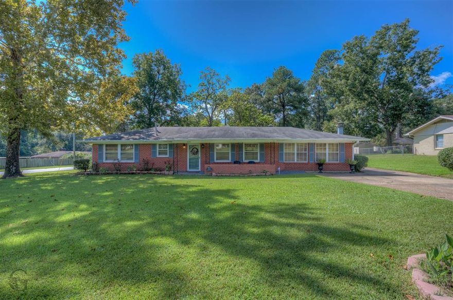 Near Cross Lake and minutes from Bossier City, so have your cake and eat it too! Charming West Shreveport Home on a Spacious Lot Near Ford Park! Welcome to this beautifully maintained home nestled on a large corner lot in desirable West Shreveport. Just across the street from the recreational paradise of Ford Park, you'll enjoy easy access to two playgrounds, two ball fields, a fishing pier on Cross Lake, a boat launch, tennis courts, and a scenic walking track-perfect for active lifestyles and peaceful weekends alike. This home boasts a gorgeous and versatile layout, featuring a cozy den with a fireplace for relaxed evenings, a formal living room for elegant gatherings, and a formal dining room ideal for hosting family meals and celebrations. The spacious kitchen includes an eating bar that opens into the living space, providing the perfect spot for casual dining or morning coffee. Step outside to a large covered back patio, ideal for lounging, grilling, or entertaining guests, rain or shine. A detached garage offers generous storage or workshop potential. Don't miss the chance to own this well-kept gem in a convenient, nature-rich location. Whether you're looking for room to grow or a place to unwind, this home truly has it all. Schedule your private tour today and fall in love with your next home.