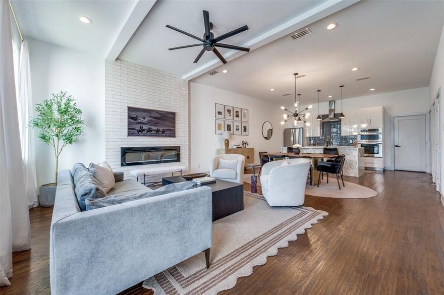 Modern Living Near White Rock Lake—Without the Million-Dollar Price Tag! Welcome to 712 Rainwater, where modern design meets everyday comfort in the heart of East Dallas. Perfectly positioned between Lochwood and Old Lake Highlands, this stunning home offers the lifestyle you want just one mile from White Rock Lake. Spanning over 2,600 square feet across three stylish levels, this 3-bedroom, 2.5-bath home delivers more space than most—paired with elevated finishes throughout. Step inside to soaring ceilings, abundant natural light, rich hardwood floors, and a striking floating staircase that instantly sets the tone. The open-concept main level is designed for real living—whether you're enjoying a quiet night in or entertaining friends. The chef’s kitchen features a dramatic waterfall island, stainless steel appliances, an external vent hood, a spacious walk-in pantry, and an additional oversized storage closet. The second floor offers exceptional flexibility, with two generously sized bedrooms, a full bathroom, and a versatile second living area—perfect for a home office, Peloton setup, media lounge, or private retreat. Your third-floor primary suite feels like a private penthouse, complete with a spa-inspired bath featuring a soaking tub, oversized shower, dual vanities, and floor-to-ceiling luxury tile. Step outside to your private covered balcony, the perfect place for morning coffee or unwinding with a glass of wine at the end of the day. Outside, enjoy a fenced front yard, plus access to a community dog park and green space. An attached two-car garage and convenient proximity to Downtown Dallas, White Rock Lake, major highways, and some of East Dallas’ favorite brunch spots make everyday living effortless. 706 Rainwater isn’t just a home—it’s the lifestyle upgrade you’ve been waiting for.