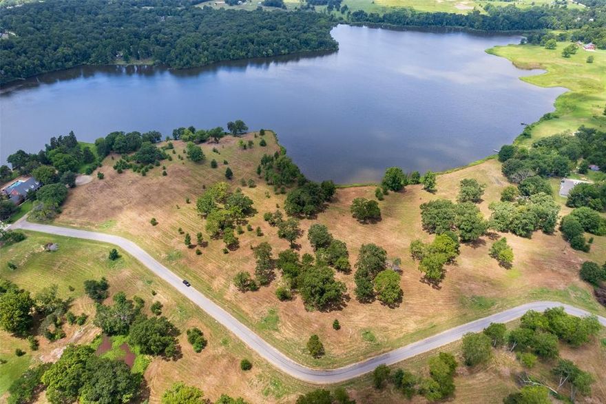 Rare opportunity for waterfront on a quiet lake with beautiful views in a spacious neighborhood! Nestled on Lake Tankersley in Northeast, Texas, this attractive, gently-sloped 1 acre property has access to 113 feet of shoreline. Carolina Way is a new subdivision offering oversized lots, making it the perfect place to spread out & build your dream home. While it is tucked away in a peaceful lake retreat, the conveniences of town are not far away, including shopping, dining, and healthcare. Come fish, relax and stay a while...waterfront lots are limited so give us a call today!