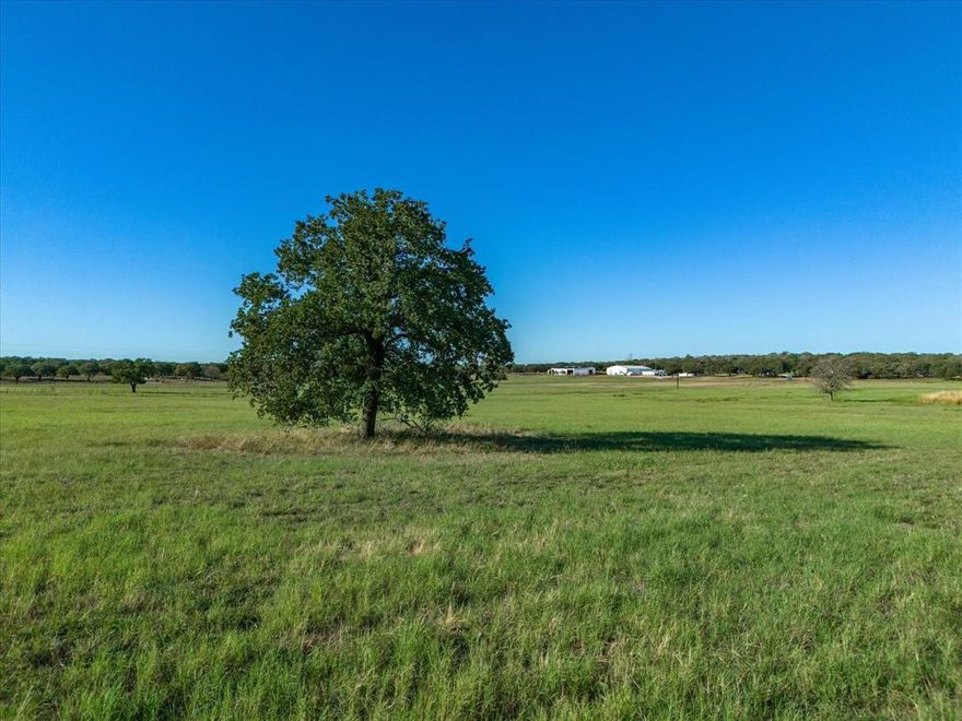 This IS the needle in the haystack! Absolutely STUNNING acreage in the heart of upscale Parker County horse properties that's loaded with a little bit of everything -- magnificent mature oak trees, a gorgeous green coastal pasture with stock tank and an elevated hilltop for luxury homesite or sites! The prettiest views in all directions, plus great soil for horses and livestock and easy access to FM 113 and Hwy 180! Great proximity to Weatherford and downtown Fort Worth!