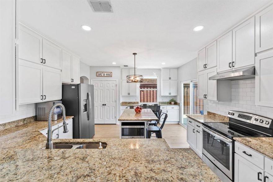 Beautifully updated 4-bedroom, 2-bath home located in a highly desirable neighborhood! Step inside to an upgraded kitchen featuring a spacious island, built-in desk area, and plenty of room for cooking and gathering. The open floorplan flows seamlessly into the inviting downstairs living room complete with a cozy fireplace. The primary suite offers a relaxing retreat with an oversized custom shower and a large walk-in closet with additional storage. Upstairs, enjoy a second living area—perfect as a game room, media space, or playroom—along with two additional bedrooms and the convenience of a 2nd-floor laundry room for easy access. Outside, you’ll find a nice backyard with an 8-ft privacy fence, a storage shed, and plenty of room to relax or entertain. An oversized garage provides even more storage for tools, hobbies, or seasonal items. A wonderful home with thoughtful updates and flexible living spaces—move-in ready and sure to impress!