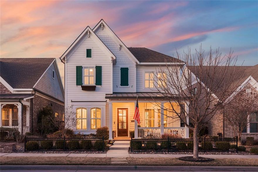 Located on a quiet interior lot in McKinney’s highly desired front-porch living community of Tucker Hill, this exceptional home blends timeless charm with thoughtful modern upgrades. Beautiful curb appeal welcomes you home, highlighted by a large, inviting front porch designed for gathering and relaxing, complete with a charming hanging daybed swing and custom gas lantern that embodies the neighborhood’s signature lifestyle.
The home is loaded with over $100,000 in upgrades, from designer decorative lighting to a Class IV impact-resistant roof. A comprehensive list of enhancements is available, reflecting the care and investment poured into every detail. The entertaining, open-concept floor plan is filled with natural light and enhanced by handsome millwork that adds character and warmth throughout.
The chef-inspired kitchen anchors the main living area and features a large gathering island, gas range, and ample workspace, making it ideal for both everyday living and hosting guests. Adjacent formal dining showcases built-in cabinetry, offering both elegance and functionality for memorable meals and celebrations.
The primary suite is conveniently located on the first floor, providing a private retreat with comfort and ease. Upstairs, three additional bedrooms are complemented by an expansive game room, offering flexible space for recreation, media, or work-from-home needs.
Step outside to a beautifully curated backyard oasis, where a serene fountain creates a peaceful setting for outdoor enjoyment. Completing the home is a two-car garage with an additional workshop area, perfect for hobbies, storage, or projects.
This Tucker Hill residence offers refined living, thoughtful design, and an unmatched sense of community—all in one of McKinney’s most sought-after neighborhoods. Prosper ISD. Move in ready!