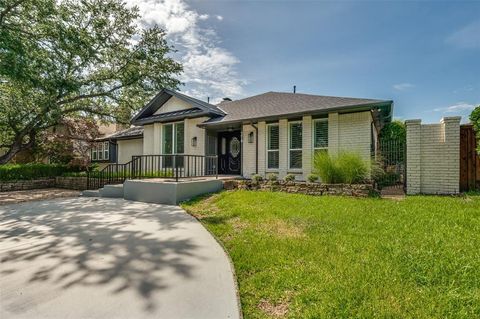 Photo of 7018 Deloache, Dallas, TX 75225 (MLS # 21314814)