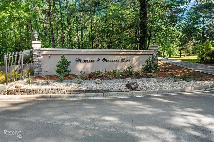 Lot for sale in pretigious Woodlake Ridge! Do not miss this incredible opportunity to build your dream home on this spacious nearly one acre lot in one of the most desirable neighborhoods in the area! This cleared lot has already had some dirt work completed, saving you time and money!! Enjoy privacy with no rear neighbors and the potential for stunning lake views from a second-story build. Tucked in a quiet community, you will love the peaceful surroundings with easy access to city conveniences. Whether you are ready to start building now or planning for the future, this lot checks all the boxes.
