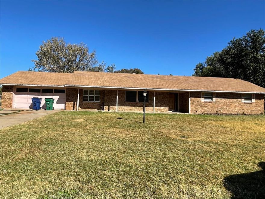 FIXER UPPER!  This 3 bedroom, 2.5  bath brick home is in a well-established neighborhood.  Formal living room, dining room and den with fireplace. Roomy backyard and nice size garage. Great place to make this home whatever you want.  This home is being sold AS IS.