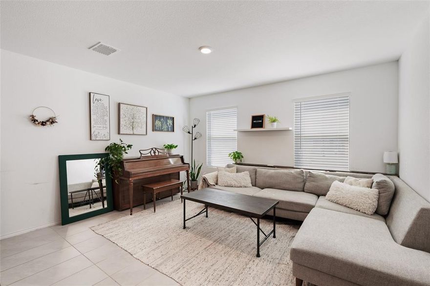 Situated on an Oversized Corner Lot with a fenced backyard, this Immaculate 3-bedroom, 2-bathroom home offers a refined blend of comfort and functionality. The light-filled Open-Concept floor plan is ideal for both entertaining and everyday living, highlighted by Beautiful Ceramic Tile flooring that adds durability and timeless appeal throughout the main living areas. The kitchen provides generous counter space and an efficient layout that opens seamlessly to the living and dining areas, creating a welcoming space for daily life. Exceptionally Well Maintained and Move-In Ready, this home also includes the added benefit of a remaining Builder Warranty for added peace of mind. Located in a desirable Princeton community, residents enjoy access to neighborhood amenities including a Pool, Playground, and Basketball Court! Just minutes from Lake Lavon, and conveniently located near McKinney, Allen, and Frisco, with approximately 40 minutes to Downtown Dallas and DFW Airport, this nearly new home offers an excellent combination of style, location, and value.