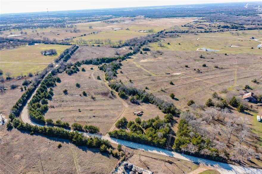 ENDLESS OPORTUNITIES!  Are you looking for beautiful, private country property? This 46 acres is it ! Prime  fully fenced acreage with native bermuda, and  a beautiful mix of large perimeter and interior trees. There are two ponds, and a large creek.   This property has been in the same family for generations, and has never had pesticides applied to it, using it  for cattle grazing.    . Enjoy the peace and quiet of the country while still close to stores and entertainment.  Property is very close to Hwy 82, 75, and 35, making easy access to the shopping and employment in  Sherman, Denison, Gainesville, Dallas and Fort Worth.  
This beautiful piece of Texas can be your new ranch home, or anything else you would like to build.   No known Restrictions!   Water and Electric are on the street.  Very close to area lakes, if boating is your interest.   Come out, and fall in love with Gainesville.