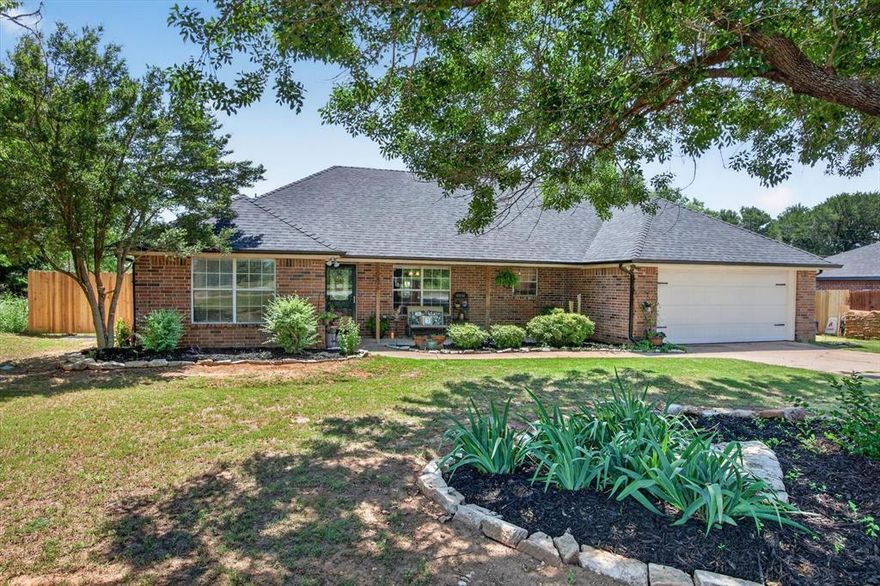 Close to town with a country feel, this home has 3 bedrooms and 2 full baths on a nice sized lot. There is a good size storage shed and a storm shelter in the backyard.  Located on the Northern side of Granbury with close access to shopping, 377 so you can be in town and out of town quickly. The patio has an amazing covered pergola like structure for outdoor enjoyment. The garage is a two car, but has a temporary wall that the current and previous owner enjoyed giving them storage, but also more room to live in the home. It makes the perfect playroom or home office.