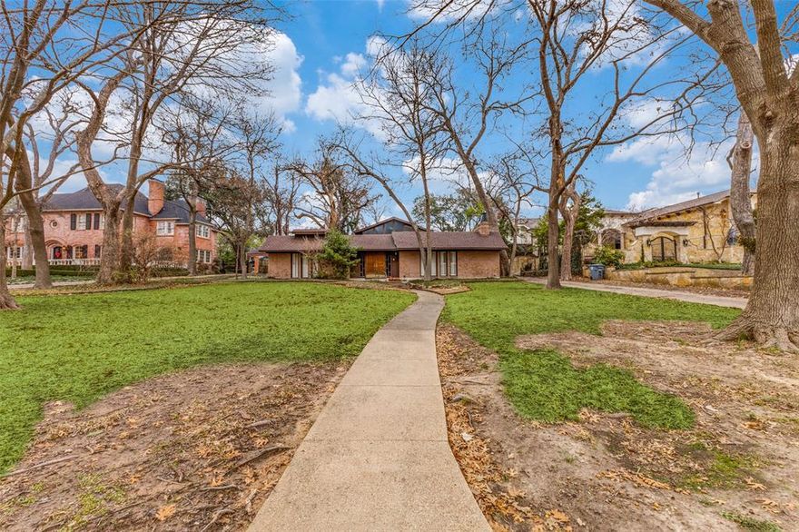 .48 acre lot on one of the most coveted streets in Lakewood. You can remodel the existing house or build your own. You can walk the lot, but to access the home, please contact the listing agent.