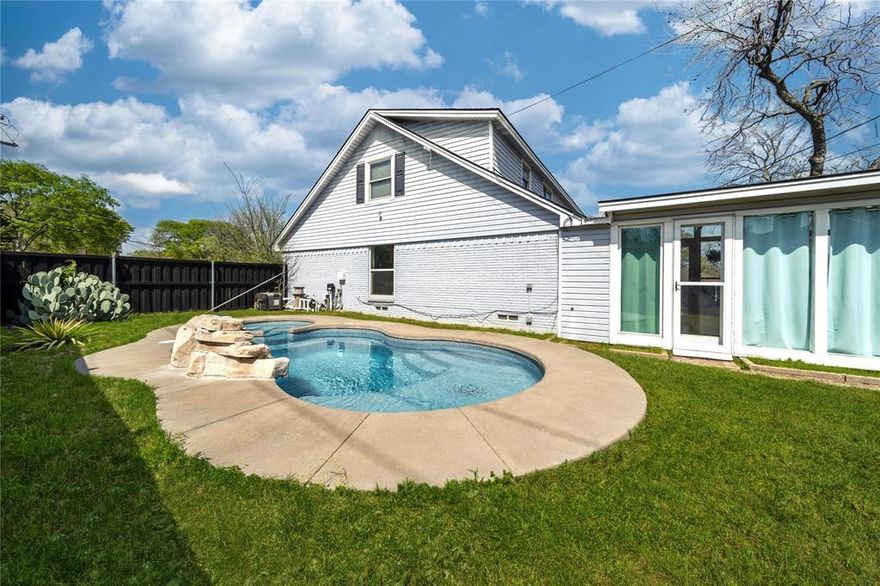 Priced to sell. This spacious and unique property offers two primary suites, an open layout with soaring ceilings, and multiple living areas including a bright sunroom that overlooks the pool. The large windows throughout bring in great natural light and highlight the open-concept living and dining area with a modern fireplace. The kitchen features granite counters, white cabinetry and stainless steel appliances with plenty of storage space.

The flexible floorplan provides several options for multi-generational living, guests, or an in-home office setup. The secondary bedrooms are well sized and the home offers great storage throughout. Step outside to your own private backyard with a pool, perfect for summer gatherings and relaxing outdoors. 

Located in a quiet, established neighborhood with convenient access to major highways, shopping, and dining, this home combines size, location, and value at an excellent price point. Selling AS IS