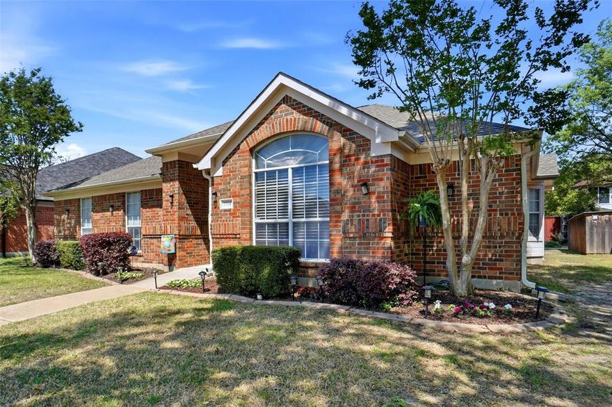 From the moment you arrive, you’ll notice how well this home has been cared for. Offering a desirable and uncommon floorplan for the area, this property features 3 bedrooms, 2 bathrooms, 2 living areas, and 2 dining and a 2 car garage, perfect for both everyday living and entertaining.  Step inside through the new front door into a spacious main living area filled with natural light, along with a formal dining space and views of the backyard patio. A dual gas-start fireplace with gas logs connects both living areas, creating a warm and inviting atmosphere throughout.  The cozy rear den opens seamlessly to the breakfast area and kitchen, making it an ideal gathering space. The kitchen is well-equipped with a built-in oven and microwave, gas cooktop, center island for extra prep space, and recently updated countertops, sink, and faucet.  Enjoy outdoor living with a covered patio overlooking a large backyard enclosed by a wood and vinyl fence, plenty of space to relax, play, or entertain.  The split-bedroom layout provides privacy, with a spacious primary suite featuring vaulted ceilings, abundant natural light, and an ensuite bath complete with a garden tub, separate shower, large vanity, separate water closet, and a generous walk-in closet.  Major updates offer peace of mind ROOF REPLACED END OF 2025, HVAC APPROX 2 YEARS OLD, HOT WATER HEATER APPROX 6 MONTHS OLD.  Conveniently located near grocery stores, retail shopping, restaurants, and all three Mesquite ISD schools, with quick access to major highways. Nearby community amenities include a City of Mesquite park featuring a splash pad, volleyball area, basketball court, pavilion, and walking track, perfect for enjoying the outdoors and staying active.