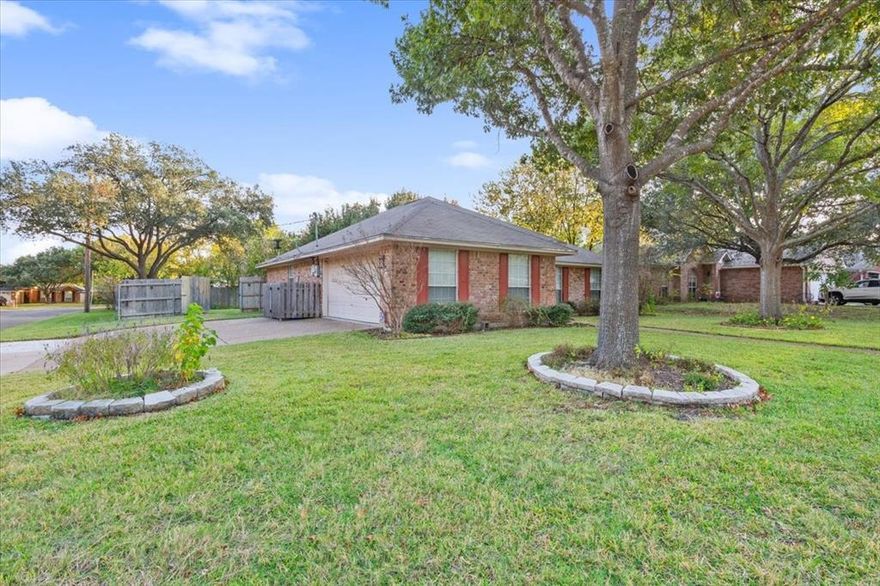 Step into this 3 bedroom, 2 bathroom home in the heart of Waco positioned on a corner lot.  
The generous living room is the perfect gathering place with a wood burning fireplace as a the focal point.
There is ample counter space and cabinetry with built in dividers for cook ware or trays.
The primary bedroom is complete with a ensuite bathroom featuring a walk in shower and whirlpool tub. The double vanity is the perfect spot for getting ready for the day.  Also, there are two walk-in closets.
The well maintained back yard features a covered patio and storage or workshop that is insulated.
This home is conveniently located in a vibrant neighborhood close to schools, shopping, parks and many amenities