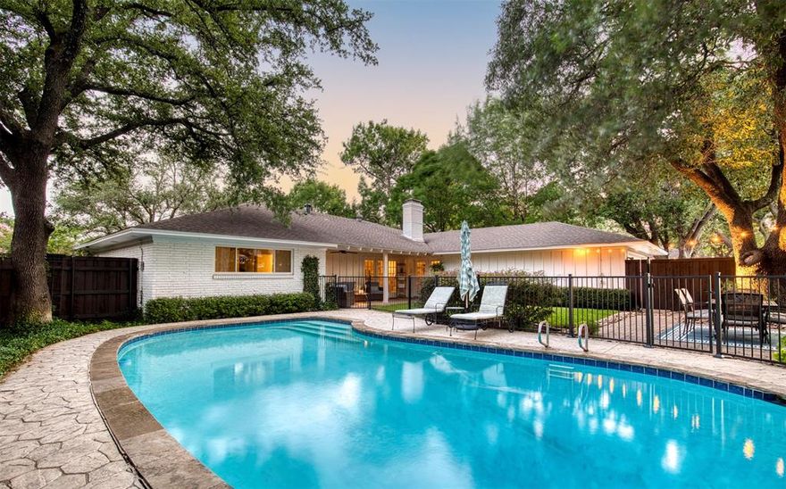 Exceptional Dallas home in the highly sought-after private-school corridor with the best backyard on the block! The outdoor space features a covered patio, spacious yard, completely fenced-in sparkling pool and a cozy dining patio under the mature tree with twinkle lights. Thoughtfully updated bathrooms and kitchen perfectly compliment the preserved original charm. Open concept kitchen island and family room, breakfast nook with coffee bar. 4 spacious bedrooms, 2.5 bathrooms, full sized laundry room, attached garage. Primary suite is spacious and offers dual walk-in closets, a beautifully updated ensuite bath and a sitting area. Don't miss this price to get into this neighborhood, ideally located with convenient access to premier private schools, highways and neighborhood shops & restaurants.