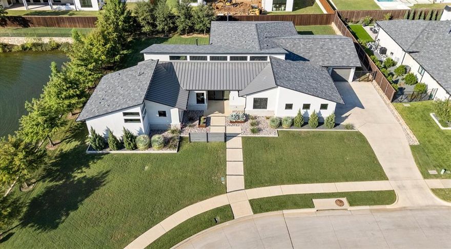 Welcome to the epitome of luxury living in this stunning single story Atwood Custom Home, located in the gated community of Oakleigh. You will enjoy complete privacy in this highly esteemed 23 custom home site neighborhood with three large common areas and a beautiful water feature. This exquisite residence features an array of elegant and thoughtfully designed spaces, including an open-concept gourmet chef’s kitchen equipped with premium Dacor appliances and a convenient butler's pantry with vast storage options. Working from home has never been more enjoyable than this one of a kind office encased in floor-to-ceiling glass, built-in shelves & abundance of natural light. The game room is a must see complete with a walk-around bar & sliding doors that provide the perfect opportunity for indoor-outdoor living! The primary suite serves as a retreat offering a designer shower, separate tub and a spacious custom closet system designed for luxury and organization. Outdoor living is equally impressive, with two resort-like enclosed outdoor areas with automatic shades and one with a decorative stone fireplace that offer the perfect setting for relaxation or entertaining guests. This peaceful oasis truly provides a seamless blend of comfort, style, and sophistication. Do not miss your chance to make this your next dream home!