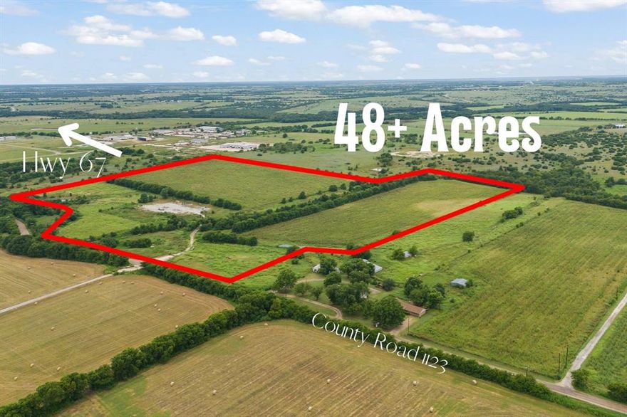 Discover the perfect blend of country living and convenience with this expansive 48+ acre property, ideally situated just minutes from Highway 67 and only about 10 minutes from Chisholm Trail Parkway. Whether you're looking to build your dream home, create a private family ranch, or invest in land with future potential, this versatile acreage offers endless opportunities. 

Enjoy wide open spaces and plenty of room for livestock, farming, or recreational use. With easy access to major thoroughfares, commuting to Fort Worth or surrounding areas is a breeze—providing rural serenity without sacrificing modern convenience. Co-Op Electric Available and water provided by Johnson County Special Utilities District.

Don’t miss your chance to own a prime piece of Texas land in a rapidly growing area. Bring your vision and make it a reality!

Property has previously had 3 cuttings per year of Coastal hay on about 10 acres. This produces about 30-40 round bales per year. There are 3 cattle guards on the property as well. Back of property is partially in a flood zone. Deed restrictions to be added at closing.