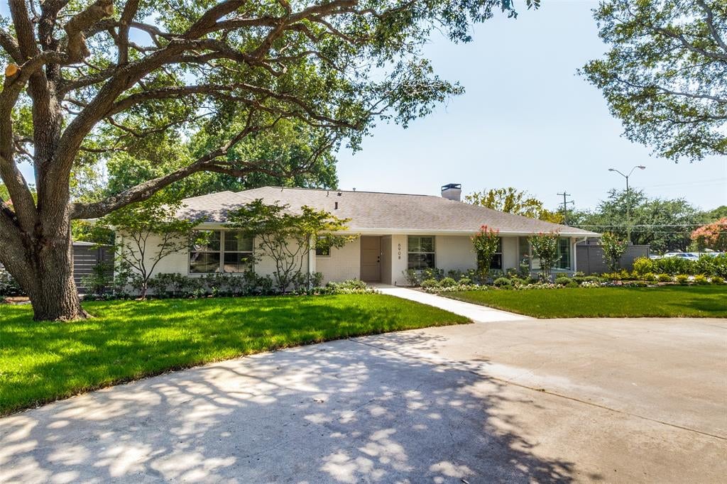 Photo of 6908 Lavendale, Dallas, TX 75230 (MLS # 21409171)