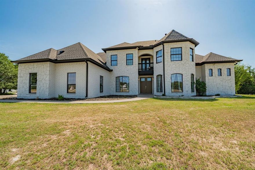 Welcome to 4.44 acres of pure bliss and endless possibilities. Originally built for and lived in by a MercyMe's Bass Guitarist! Come see this perfect setting where you can create your dream homestead, private retreat, or income producing investment just 30 minutes from Rockwall. This rare property features TWO homes, a workshop, and sprawling outdoor amenities, all with no HOA, no deed restrictions, and horses permitted!

The fully renovated main home, completed in 2022, offers 4,500 square feet of beautifully updated living space. With 5 bedrooms, 3.5 bathrooms, and two spacious living rooms, each with its own fireplace, there’s room for everyone. The open concept design seamlessly connects the kitchen, dining, and main living areas. The first floor features two bedrooms and 1.5 baths, walk-in closets, while the second floor includes three additional bedrooms and two full baths. A media room, full utility room, and a third-floor bonus loft provide even more versatility for family life or entertaining.

An additional unit, built in 2022, offers 1,100 square feet with 6 bedrooms, 2 bathrooms, a full kitchen, living room, and utility room. Whether you envision guest lodging, long term rental income, or accommodations for extended family, this additional dwelling expands your options.

A 1,600 square foot workshop with electric is ready for hobbies, storage, or a home based business. Outside, enjoy a large covered patio, a private gun range, and a spacious slab that could easily be converted into a pickleball court. The land features gently rolling pasture terrain, a serene private lake view, and a half mile walking trail through your own private greenbelt. There’s plenty of room for a pool, gardens, farm animals, and more.

This is the kind of freedom that’s hard to find. This property is a rare find that combines functionality, beauty, and flexibility, all within easy reach of the city. Note: Buyer and buyer’s agent to verify all information.