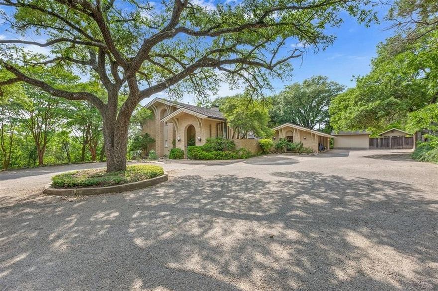 Extremely Rare opportunity to own this secluded masterpiece of a home designed by Waco Architect Shuford Farmer that sits on over 1.5 beautifully treed acres in Waco, Texas.  Dramatic entrance into the Courtyard welcomes you with one of a kind Royal Eniz stained glass creation that surrounds the front entry, stunning wood staircase,  beautifully inlaid floors, and views from the moment you enter the home. This Classy Home offers over 5,000 square feet, with 5 bedrooms and 5 full bathrooms, Library, Family Room with wall to ceiling windows overlooking the Tranquil backyard and Lake Waco, Wine closet, oversized Laundry room, Balconies off all upstairs Bedrooms, Wet bar, beautiful Pool & lounge area, Green House, Garden area, Storage shed, Workshop area, and surplus of storage throughout home. Generous sized bedrooms throughout. Master bedroom with 3 closets, bathroom fit for a King and Queen, plus a Balcony to enjoy every morning & evening. Gourmet Kitchen with 2 Gaggenau ovens, a grilling island with a 6 burner Russell gas cooktop, Abbaka custom range hood, Built in Fridge, additional Subzero Fridge/ Freezer, abundance of storage and counter space, and living or dining area overlooking the pool and backyard.

In 2022, this sensational home was the stage for a motion picture coming out in the near future by Malcom Goodwin. With exquisite taste throughout, stunning light quality in every space, serene surroundings - this One of a Kind Waco beauty offers privacy, comfort, and elegance.