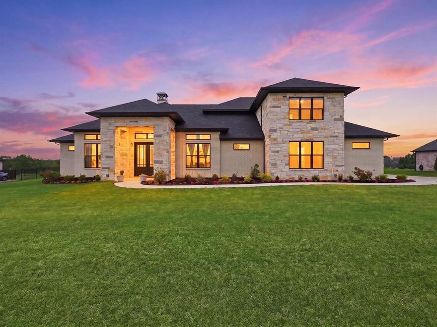 Don’t miss this opportunity to own a like-new home in the highly desirable Blue Hills community. Situated on over an acre, this exceptional property offers a country living with the convenience of nearby amenities—giving you the space to breathe without sacrificing accessibility. This custom-built residence features 4 bedrooms, 3 full bathrooms and 2 half bathrooms, plus a large office with closet that can easily serve as a 5th bedroom, a game room, media room, over 3,700 square feet, and a spacious 3-car garage. Every detail blends modern elegance with everyday comfort, highlighted by a designer finish-out with high-end touches throughout, including extensive custom built-ins and tall cabinetry. Mornings begin in a light-filled, chef-inspired kitchen complete with a stunning waterfall island, built-in refrigerator, commercial-grade range, and a large custom hidden pantry. Designed with convenience in mind, the laundry room connects directly to the primary closet and features abundant custom cabinetry. Upstairs, a media room is ready for movie nights, while the spacious game room offers flexibility for entertaining or relaxing. A secondary bedroom with a private bath provides the perfect setup for guests or extended family. Step outside and imagine the possibilities. With over an acre, a gas line already in place for a future outdoor kitchen, and plenty of space to build a pool, you can create your ideal backyard retreat, complete with a large covered patio for year-round enjoyment. Additional features include soft-close cabinetry, smart home wiring, spray foam insulation, insulated garage walls, an engineered foundation with piers supporting a reinforced slab for added stability, and an epoxy-finished garage floor. Ideally located just minutes from Sherman, approx 25 minutes to McKinney, and under an hour to Dallas Fort Worth Airport. Zoned to the highly regarded Van Alstyne ISD. With a low HOA of $650 per year.  This home is truly amazing!
