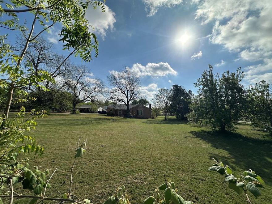 Prime Investment Opportunity on Boat Club Road! Seize a rare opportunity to acquire over 2 acres of high-visibility real estate with significant frontage on Boat Club Road. Perfectly positioned in a growing professional corridor, this property is situated directly adjacent to a medical office and just down the street from the local YMCA. The estate includes a 1,932-sq.-ft. main residence, per Tarrant County Tax records. an auxiliary house, and multiple outbuildings, offering a versatile canvas for redevelopment or a custom multi-structure project. The property is being sold as-is, providing a true blank slate for the visionary buyer.