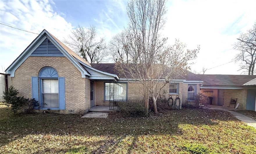 Rare Residential + Commercial Combo! This unique dual-property package offers a 1,900 sq. ft. residence and a 1,200 sq. ft. commercial building, giving you the ultimate work-from-home lifestyle. The 3-bed, 2-bath home is a spacious blank canvas ready for your custom updates. Just steps away, the former upholstery shop is primed for action with front and rear entries, side-loading garage doors, and built-in workspaces. Sold as-is, this is the perfect setup for a small business owner. (For details on commercial building see mls 21163203)