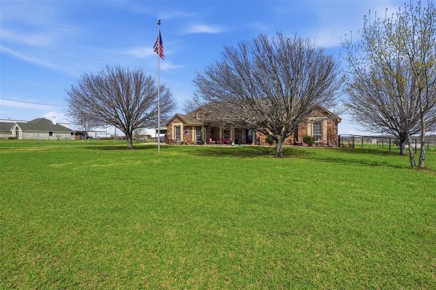 Discover peaceful country living with this beautiful 4-bedroom, 2-bath home situated on 5 scenic acres. The residence features an open-concept layout with a split-bedroom design, offering both functionality and privacy. A dedicated office and spacious game room provide flexible living space ideal for work, entertainment, or hobbies. The property is fully pipe-fenced and thoughtfully divided to accommodate both large animals and a separate dog run, and includes a picturesque pond. Outdoor amenities make this property truly special, featuring a refreshing pool with deck, large covered back porch perfect for relaxing or entertaining, and a storm cellar for added peace of mind. Additional improvements include a 50-amp RV hookup and an impressive shop that has been converted into a party barn with a private guest suite. The guest quarters include a bedroom, bathroom, and kitchenette, making it ideal for visitors, extended family, or potential second living quarters. This versatile property offers the perfect blend of comfort, recreation, and country charm. If you enjoy entertaining, this home is for you!