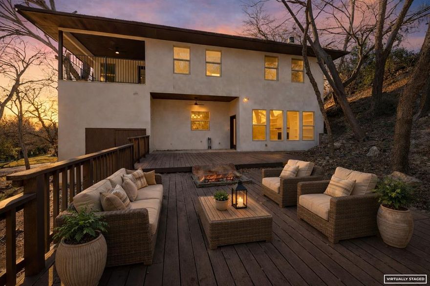 What a great opportunity to buy into Ridglea Hills!  This home has been completely remodeled by one of the best contractors in Ft Worth.  You are welcomed upon entry by a dedicated office on the right with custom built in bookshelves.  On the left you have a perfect bedroom and full bath for a mother in-law, and a large exterior closet.  The large open kitchen and living room are welcoming with plenty of room for entertaining.  The fireplace in the living room offers a central view all the way through the kitchen.  Upstairs your primary has a very large walk in closet, a fireplace, a large balcony and a fully modernized and remodeled bathroom that includes a stand alone bathtub and a large walk in shower.  At the top of the stairs you have your first secondary bedroom with two closets, neighbored by a third bedroom.  Your upstairs utility room is neighbored by a spacious full bath, all entirely remodeled.  Down the hall you have the 5th bedroom with views out front.  The home also has a metal roof that should last many many years.  The Seller is committed to adding sod and some landscaping once the weather or temperature permits.  The back yard has a large deck with a fire pit, perfect for entertainning and gatherings.