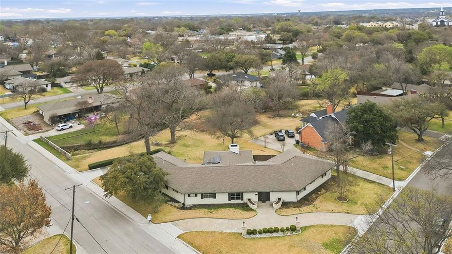 Incredible opportunity to purchase a well maintained 3 bedroom 3 full bath mid-century modern on an oversized .612 acre corner lot! This stunning residence offers an abundance of natural light, upgrades, and a host of other custom designed features. This beautiful home boasts recently installed hardwood flooring, a spacious kitchen with stainless steel appliances, and a large covered back patio with outdoor kitchen! Schedule a showing today!