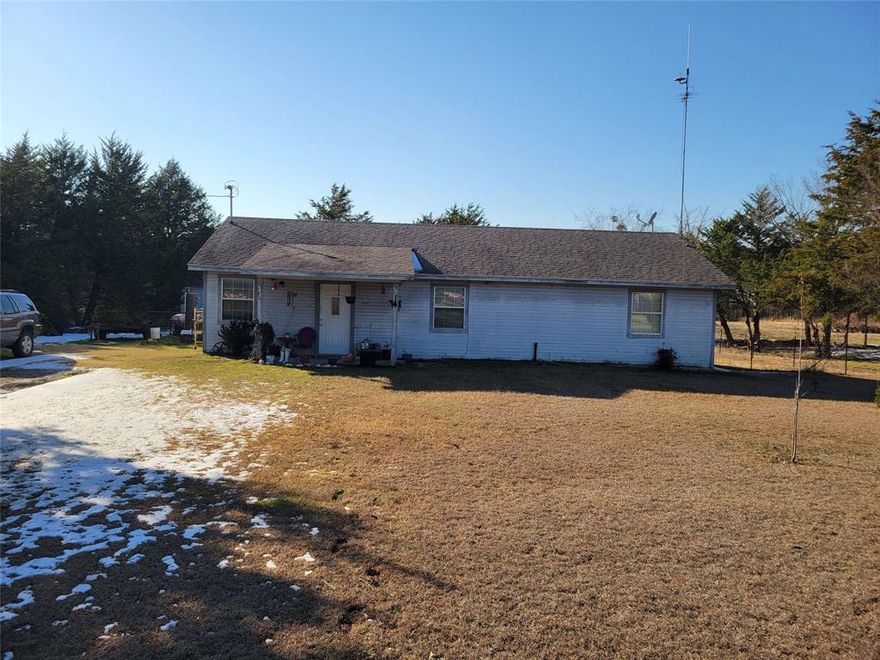 3 bedroom 2 bath with bonus room and laundry hookup. Has city water, sewer and trash service. Has 2 storage sheds.