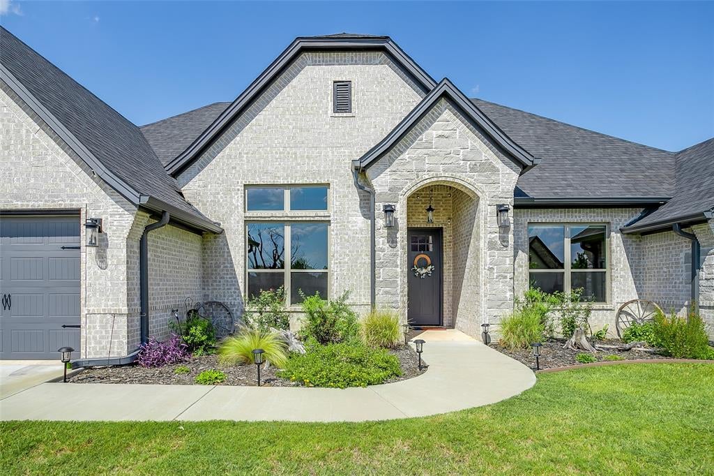 Photo of 2716 Village Road, Granbury, TX 76049 (MLS # 21373149)